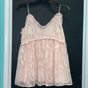 Gorgeous blush pink tank with delicate detailing.